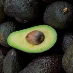 green and brown fruit on black and brown fruits