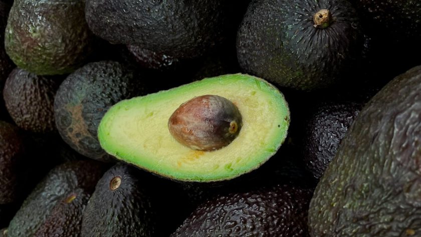green and brown fruit on black and brown fruits